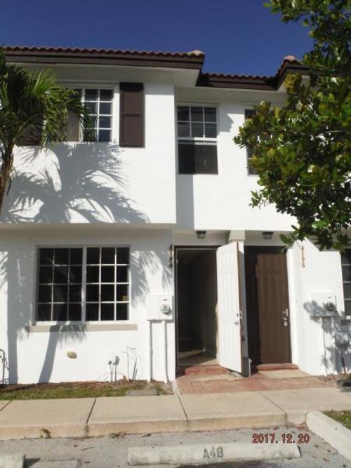 4194 Napoli Lake Dr, Riviera Beach, FL, 33410-7504 | Card Image