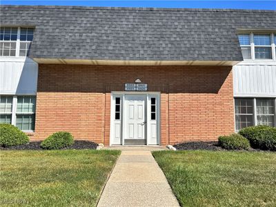 Entrance to property featuring a yard | Image 1