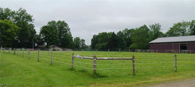View of yard with an exterior structure, an outbuilding, and a view of rural / pastoral area | Image 17