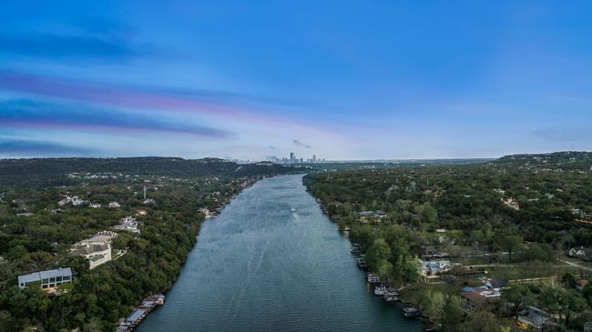 Drone / aerial view featuring a water view and a view of trees | Image 40