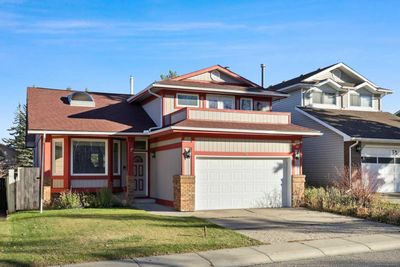 56 Woodfern Way Sw, House other with 4 bedrooms, 2 bathrooms and 4 parking in Calgary AB | Image 1