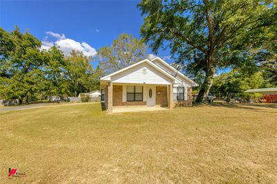 Home featuring a front lawn | Image 1