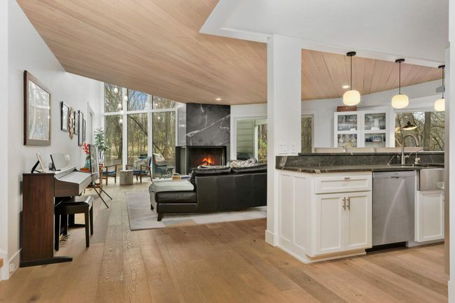 Newly updated with white oak plan floors, new windows and updated kitchen | Image 9