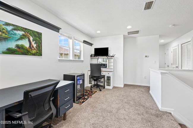 Loft or sitting area as you enter the second floor | Image 20