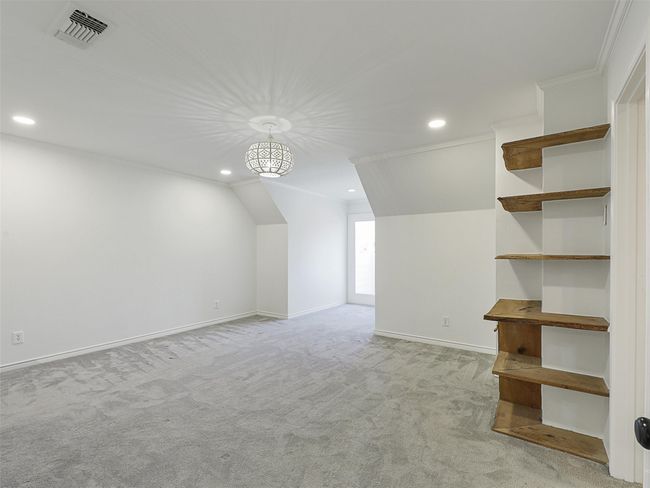 Bonus room with light carpet, baseboards, lofted ceiling, visible vents, and recessed lighting | Image 25