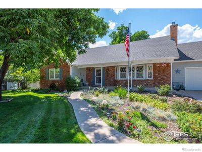 Front yard with lots of perennials | Image 1