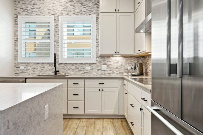 Custom built-in Thermador refrigerator. | Image 4