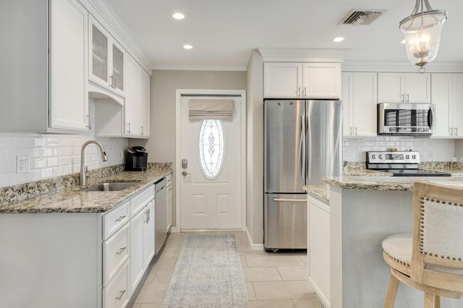 Kitchen with Carport Entry | Image 10