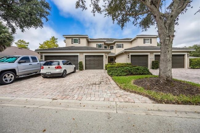 View of front of house featuring a garage | Image 23