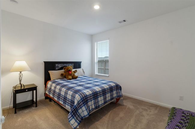 The Secondary bedroom right outside of the hallway bathroom. | Image 6