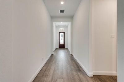 Hall with wood-type flooring | Image 2