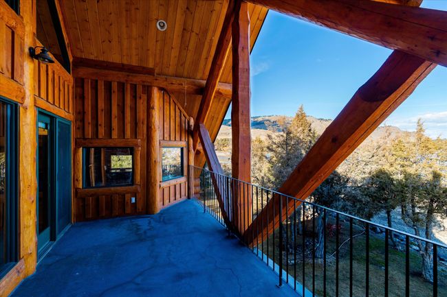 Upper level patio deck. | Image 76