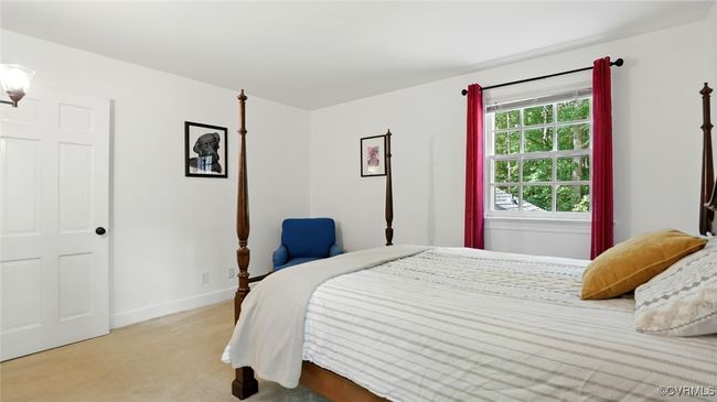 Bedroom featuring light carpet and baseboards | Image 28