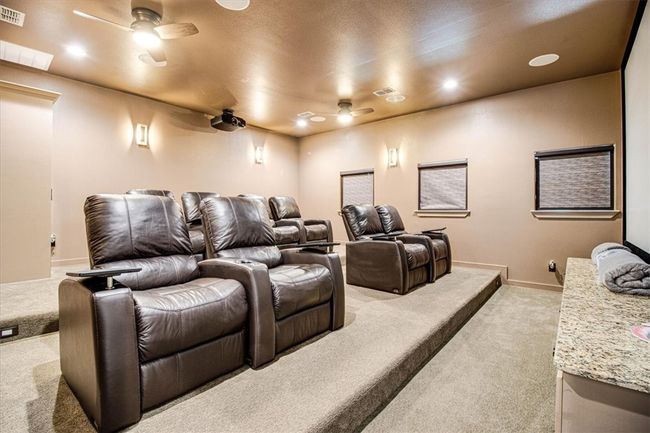 Theater with black out shades & CRESTRON home media center | Image 22