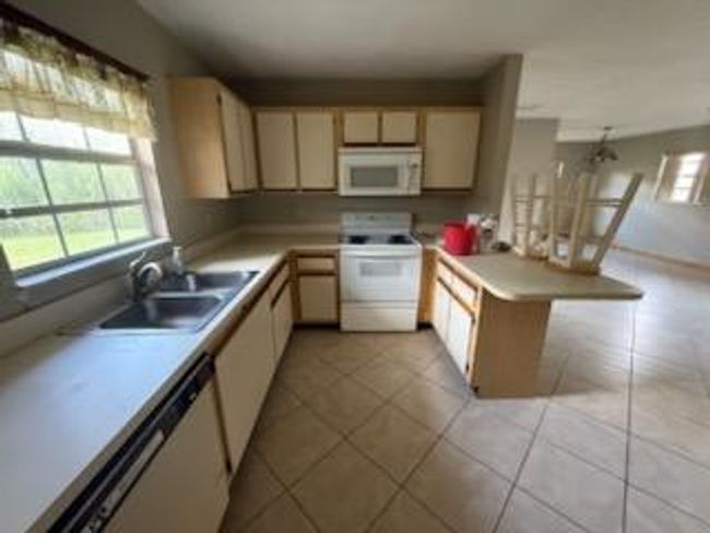 4880 Se 44 Th St, House other with 2 bedrooms, 2 bathrooms and null parking in Okeechobee FL | Image 9