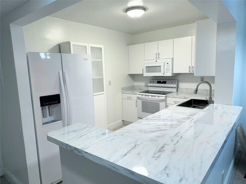 21-2a-4394 Nw 9th Ave, Deerfield Beach, FL, 33064-1765 | Card Image