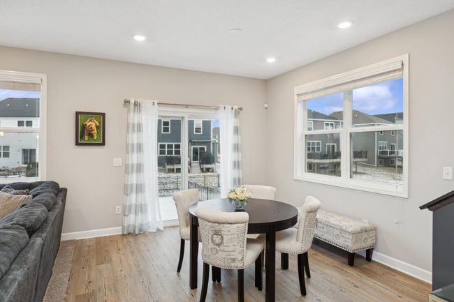 Enjoy daily dining here with sliding patio door for future deck overlooking the large, fenced in lot. | Image 7