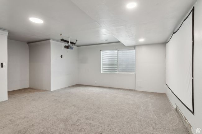 The fully finished basement features a secondary primary (4th bedroom) with 3/4 bathroom. Which would also make for a great family room with included projector. | Image 26
