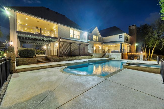 View of the huge carport and covered deck above! | Image 39