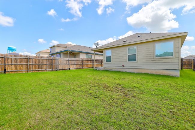 Back of property with a fenced backyard | Image 31