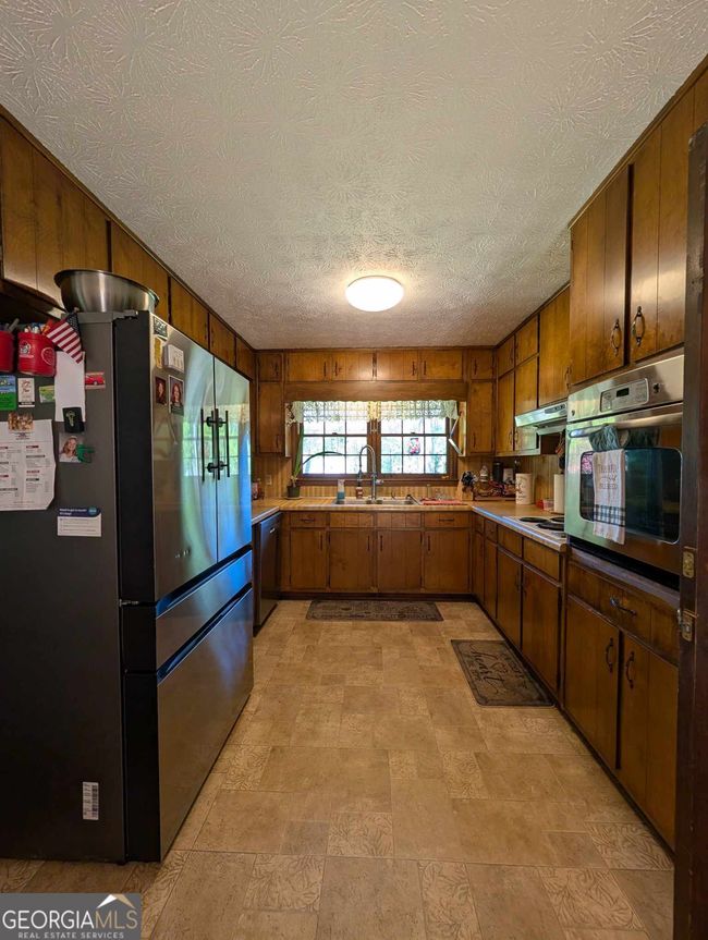 1710 Crumbley Rd, House other with 5 bedrooms, 3 bathrooms and null parking in MCDONOUGH GA | Image 11