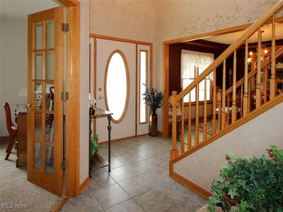 Foyer entrance featuring tile patterned floors | Image 2