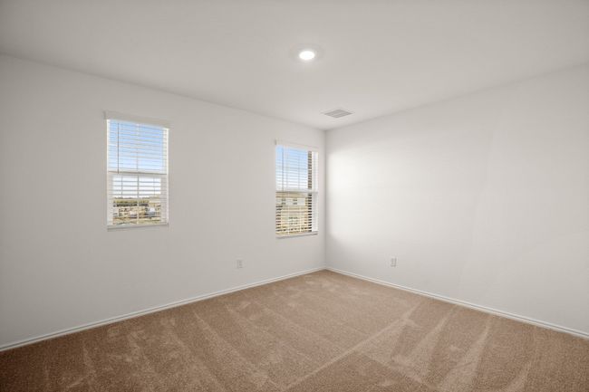 Unfurnished room featuring carpet floors, baseboards, and visible vents | Image 24