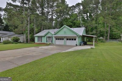 1311 Eli Lane, House other with 3 bedrooms, 2 bathrooms and 2 parking in Lawrenceville GA | Image 3