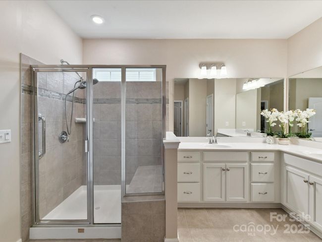 Upgraded Cabinets in Primary Bath. Walk in Shower with Bench Seat | Image 20