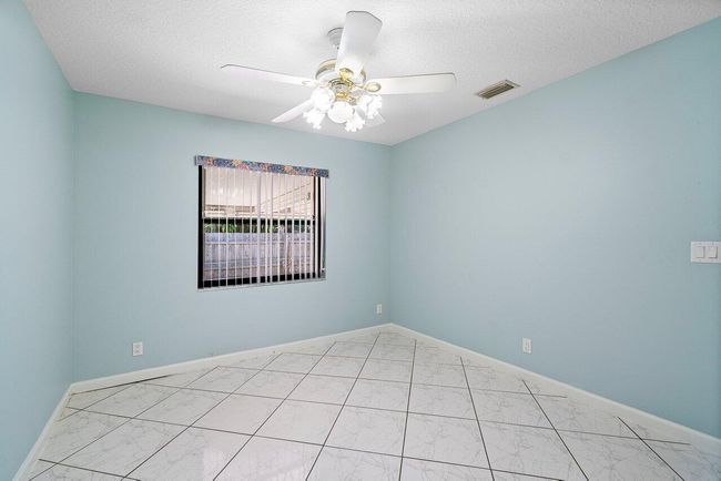 61 W Rubber Tree Dr, House other with 3 bedrooms, 2 bathrooms and null parking in Lake Worth FL | Image 14