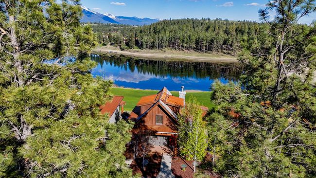 Sparkling lake with a mountain view backdrop | Image 50