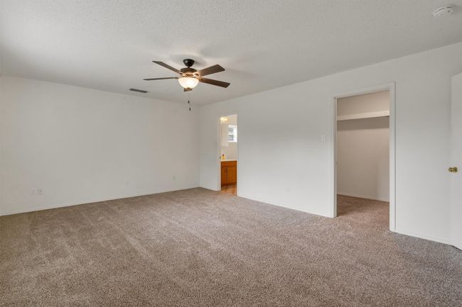 Large walk in closet and full bathroom off of apartment bedroom | Image 29