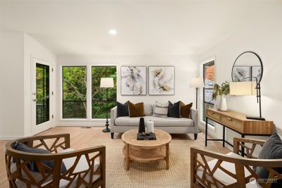 Large windows, new hardwood floors. | Image 3