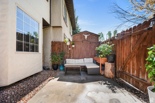 View of patio with an outdoor hangout area | Image 20