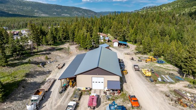 View of subject property with a heavily wooded area and mountains | Image 77