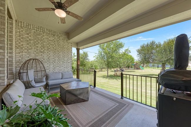 The covered back patio is the spot to relax, greet the morning, reflect on the day and/or expand your entertaining needs. | Image 17