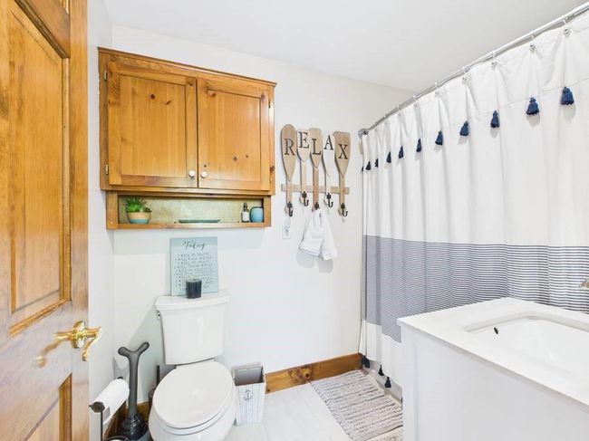 Bathroom 2 with toilet and baseboards | Image 43