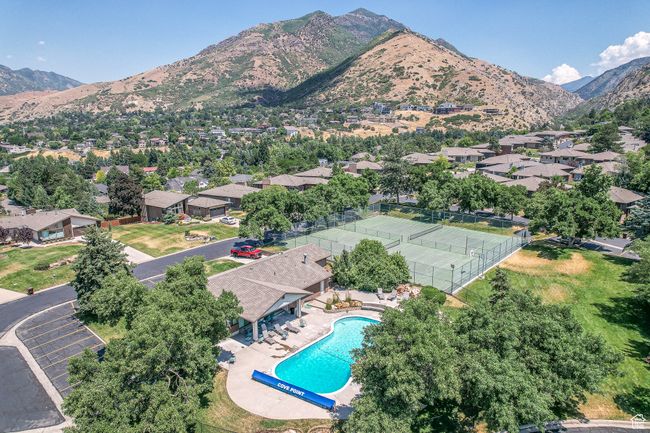 Aerial perspective of suburban area with mountains and a pool | Image 40