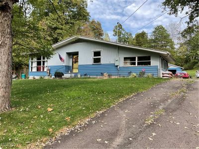 Front view with large front lawn | Image 1