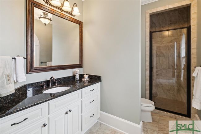 Both secondary bedrooms have en-suite baths. This one has a walk-in shower. | Image 33