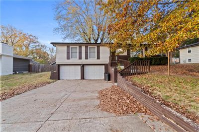 View of front of house with a garage | Image 2