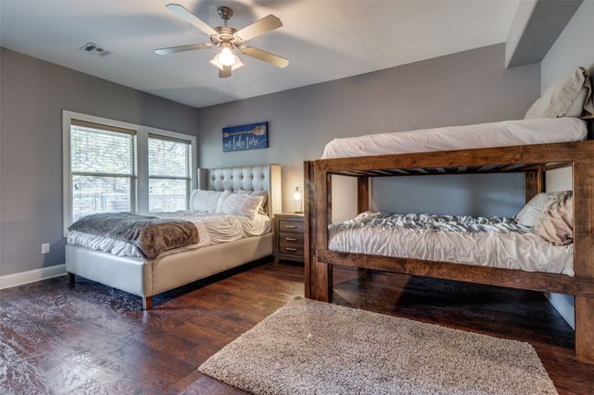Bedroom featuring dark hardwood / wood-style floors and ceiling fan | Image 18