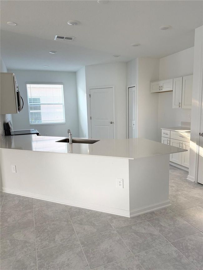 1281 Deepwater Cir, House other with 5 bedrooms, 3 bathrooms and null parking in EAGLE LAKE FL | Image 8