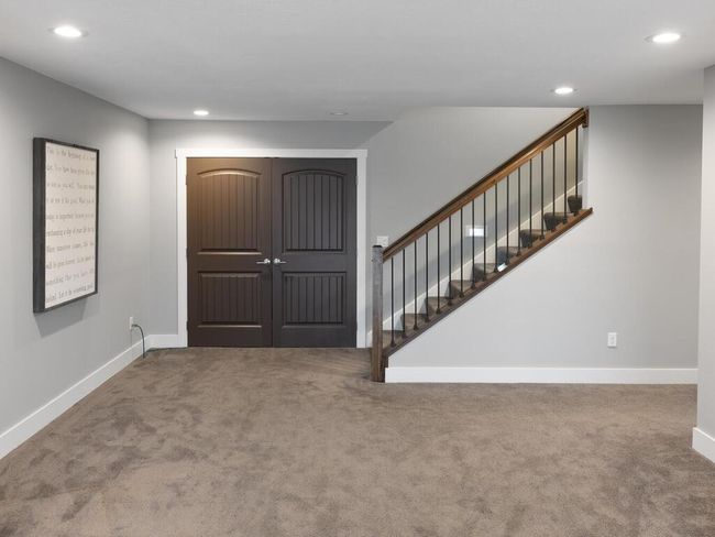double doors to storage area-lower level | Image 42