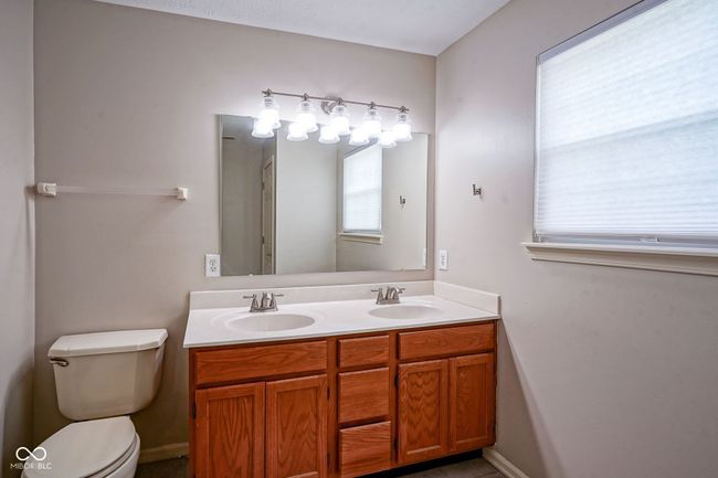 full bath with double vanity and toilet | Image 27