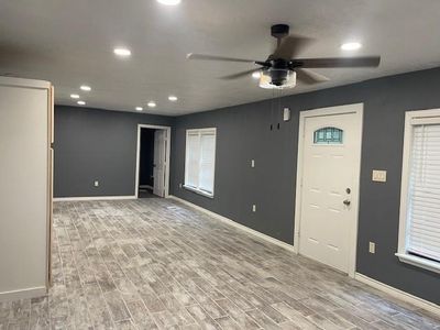 Foyer entrance featuring ceiling fan and light hardwood / wood-style floors | Image 3