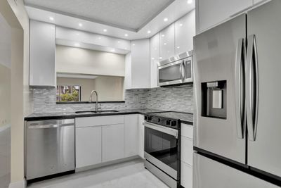 New modern kitchen with custom cabinets | Image 1