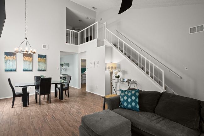 The connection to the formal dining area is effortless, with the open layout making the space feel larger and more connected, perfect for hosting or winding down. | Image 8
