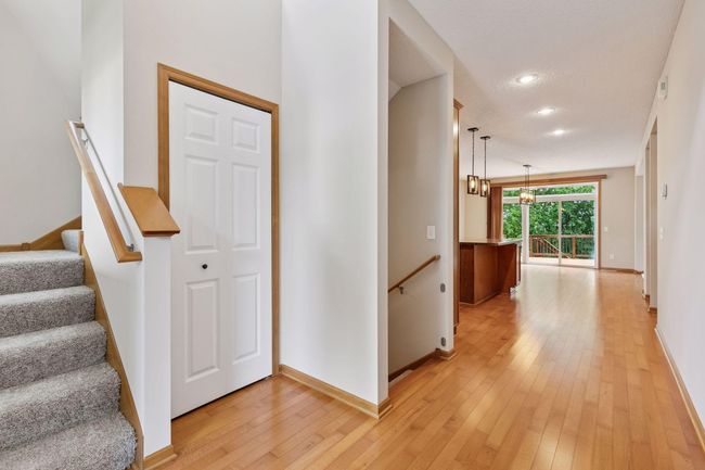 The two story foyer is a great space to welcome guests | Image 9