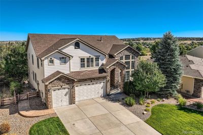 6017 Merchant Place, House other with 5 bedrooms, 5 bathrooms and 3 parking in Parker CO | Image 1